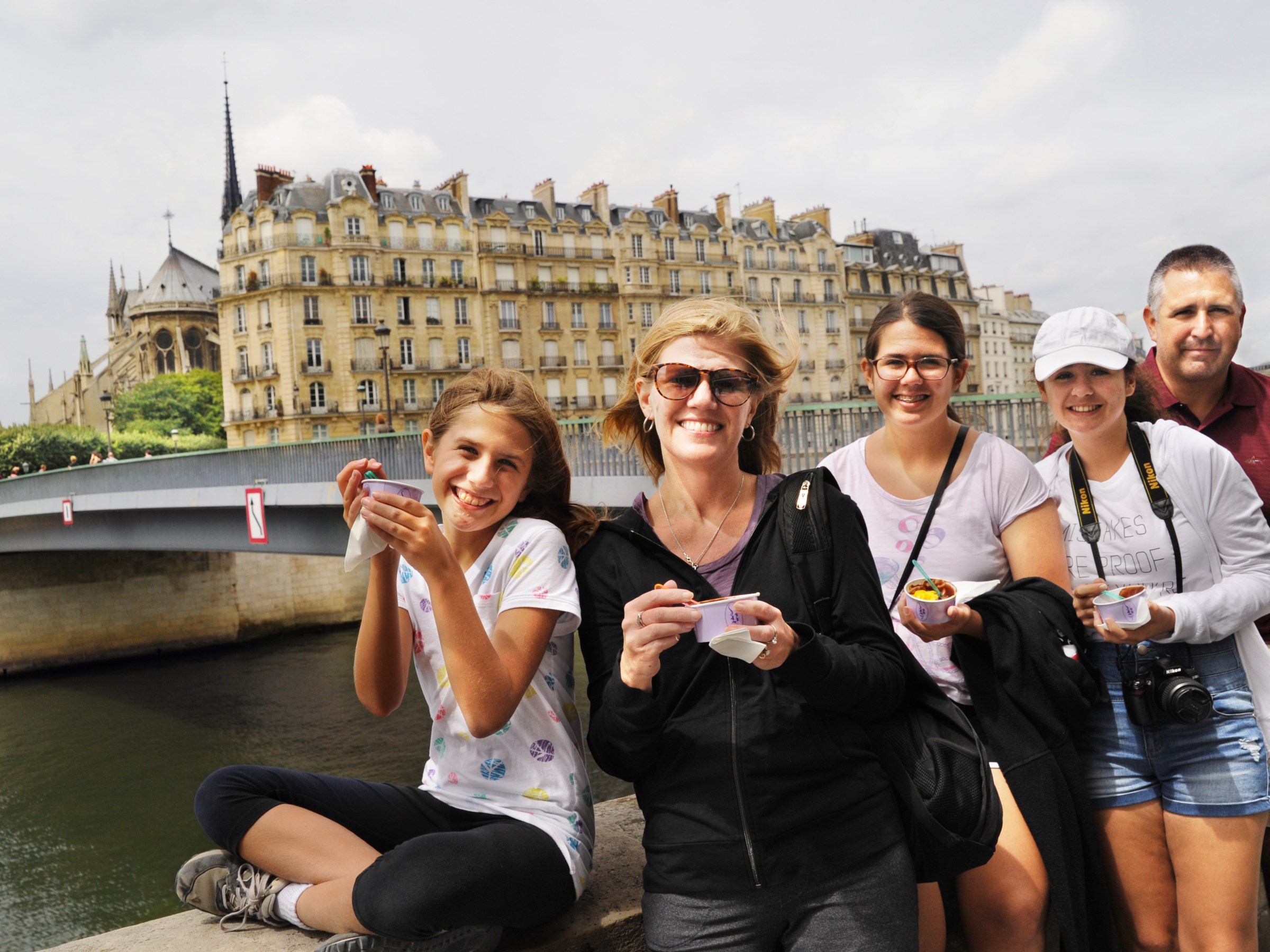 Group posing near bridge