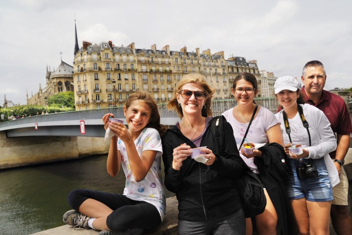 Group posing near bridge